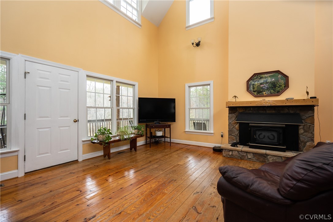 16372 Ancient Acres Road Beaverdam, VA 23015 - Photo 3 of 44 a living room with furniture a window and a fireplace