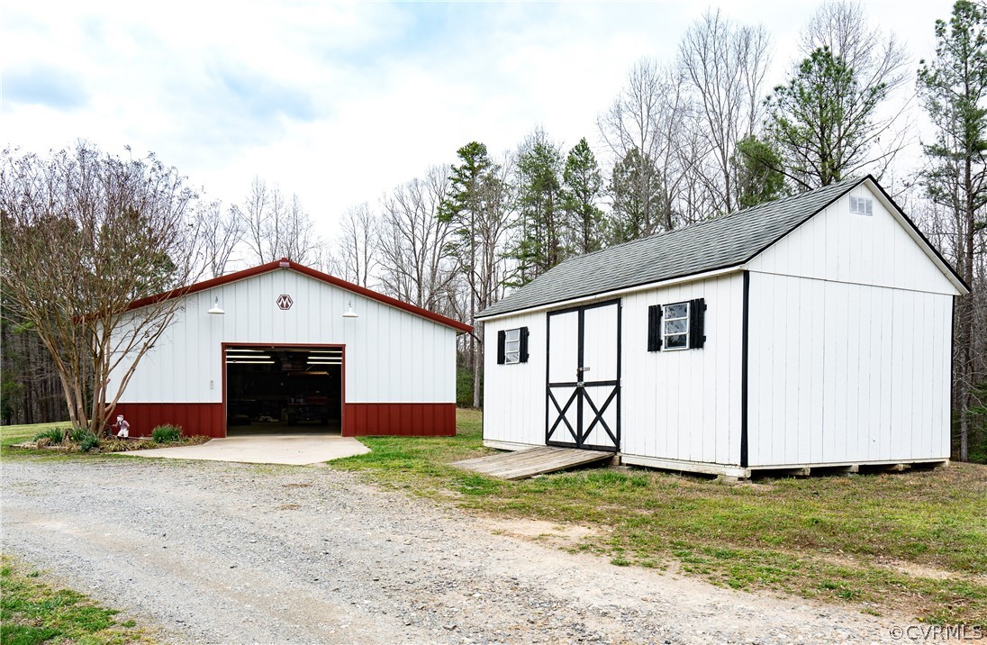 16372 Ancient Acres Road Beaverdam, VA 23015 - Photo 33 of 44 a front view of house with yard and garage