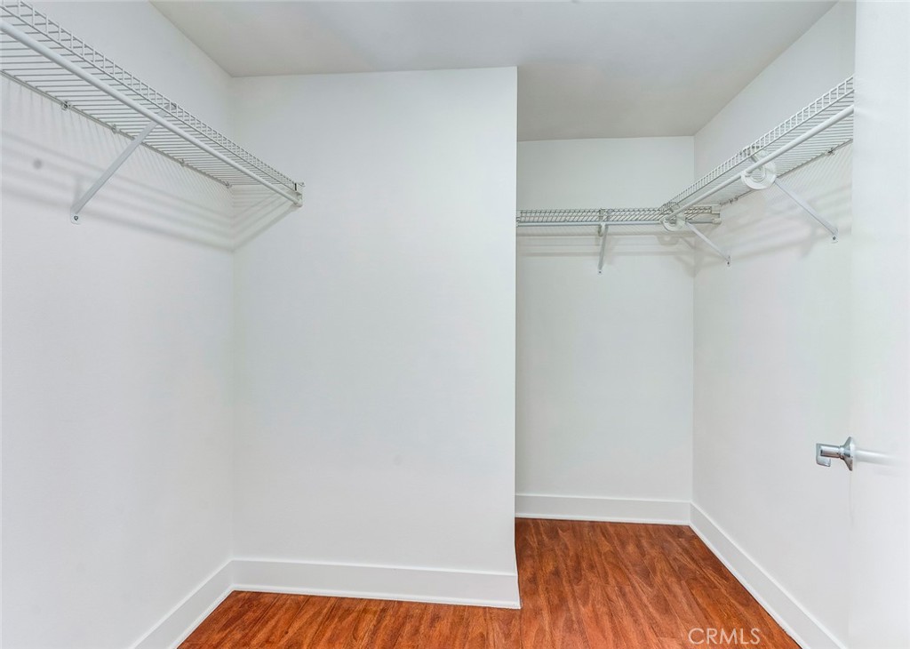 596 South Brea Boulevard Brea, CA 92821 - Photo 29 of 33 a view of walk in closet with empty racks