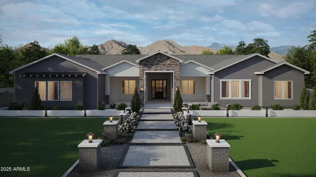 a front view of a house with a garden and patio