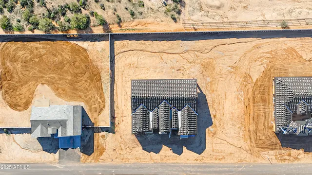 a view of front door of house with wooden floor