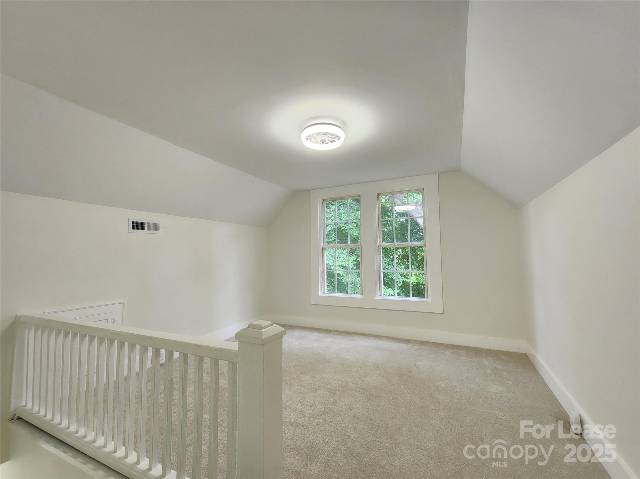 179 Duval Street Northwest Concord, NC 28025 - Photo 14 of 18 a view of an empty room with a window
