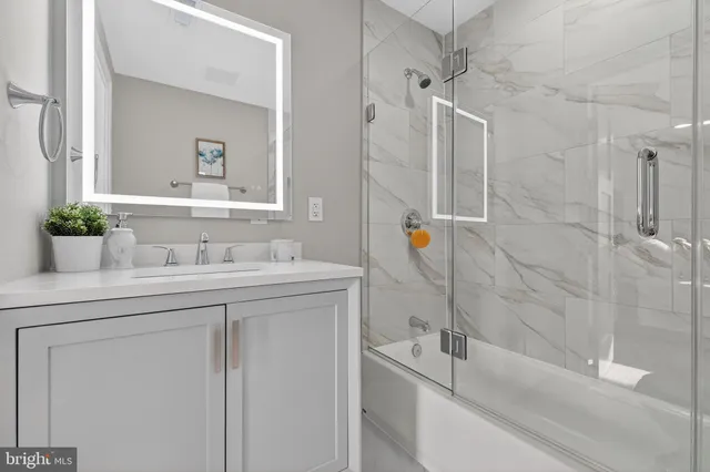 a bathroom with a sink and a tub