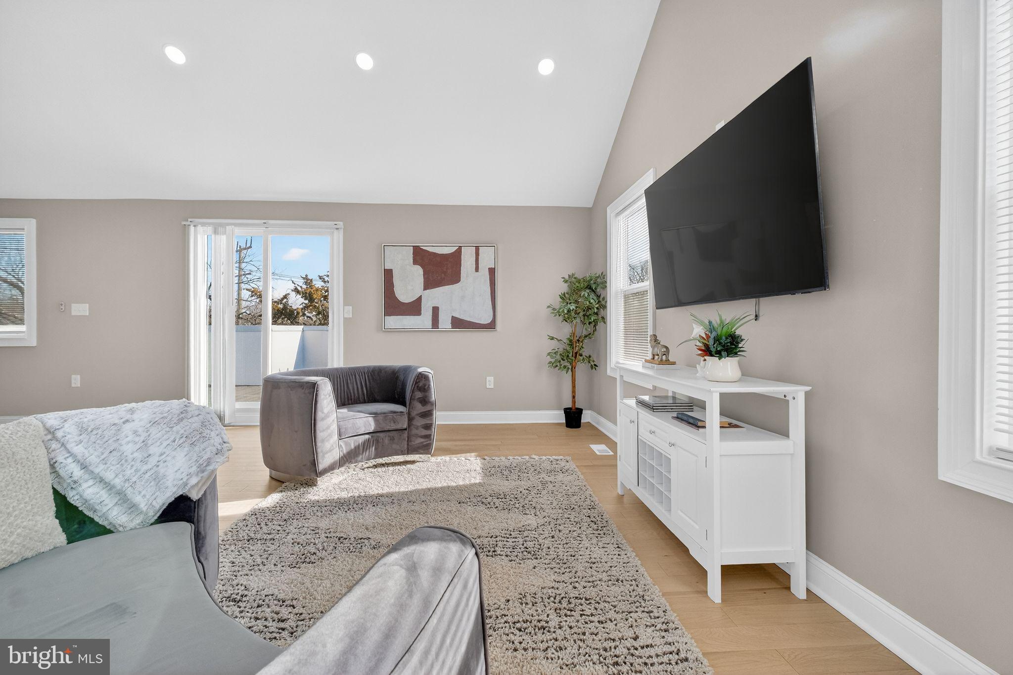 3151 Newton Street Northeast Washington, DC 20018 - Photo 26 of 49 a living room with furniture and a flat screen tv