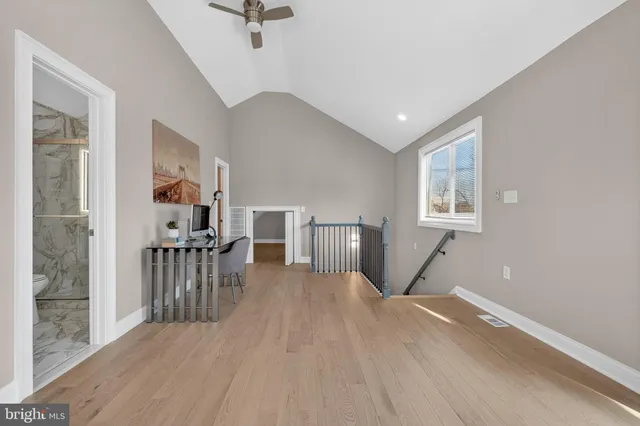 a view of a livingroom with furniture and windows