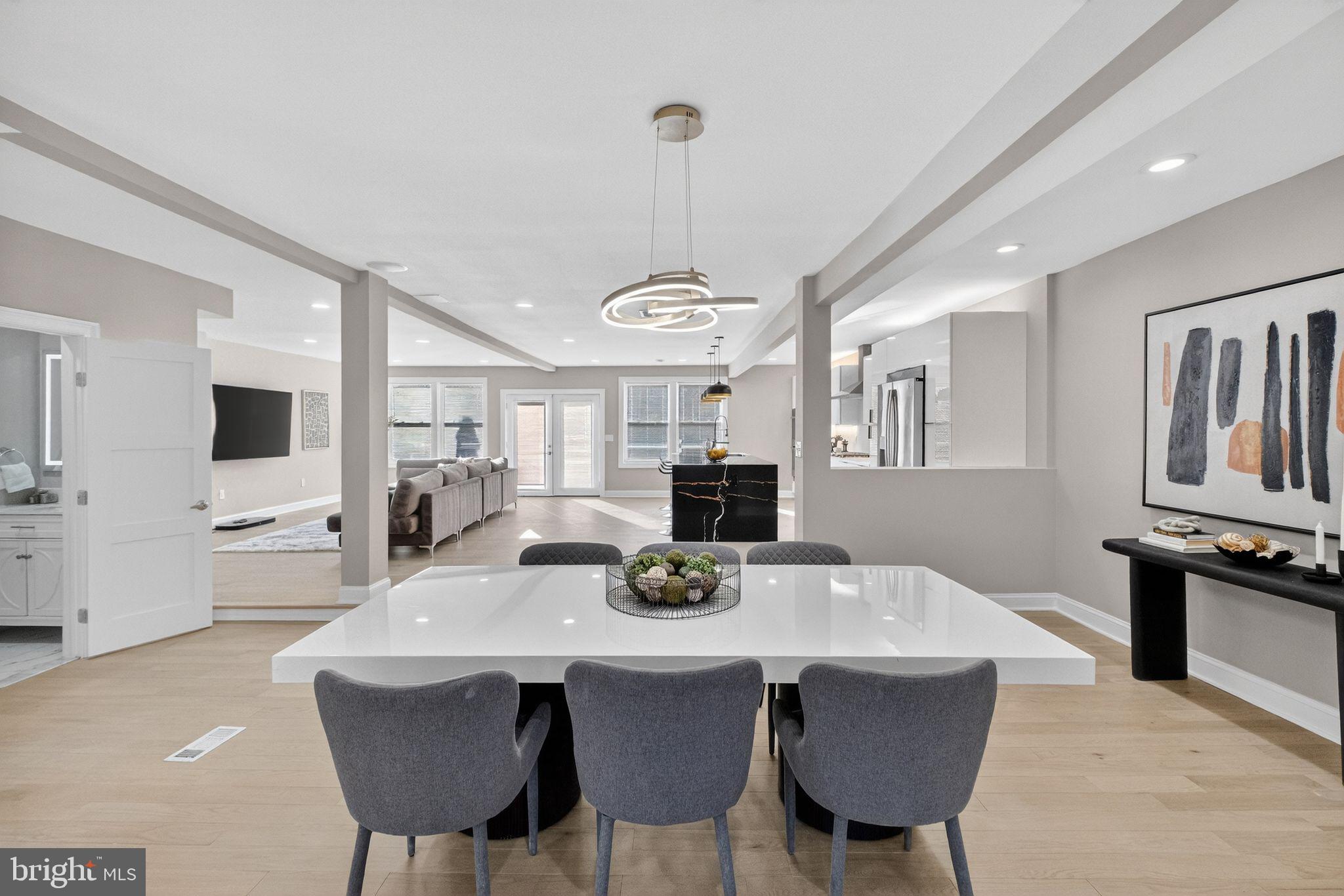 3151 Newton Street Northeast Washington, DC 20018 - Photo 6 of 49 a view of a dining room with furniture and wooden floor