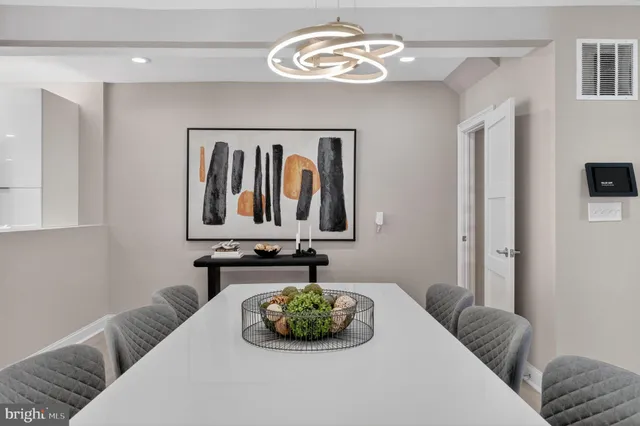 a bedroom with a bed and ceiling fan