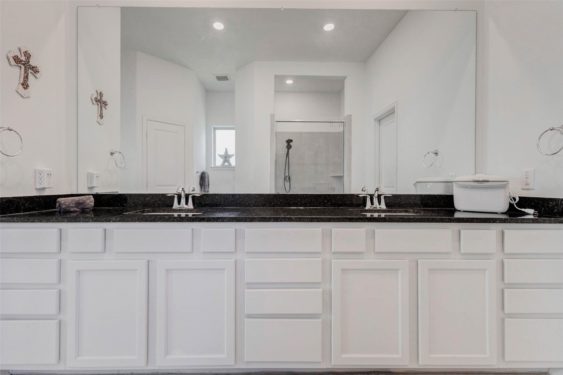 3711 Castle Rock Drive Rosenberg, TX 77469 - Photo 29 of 46 a bathroom with white cabinets and a sink