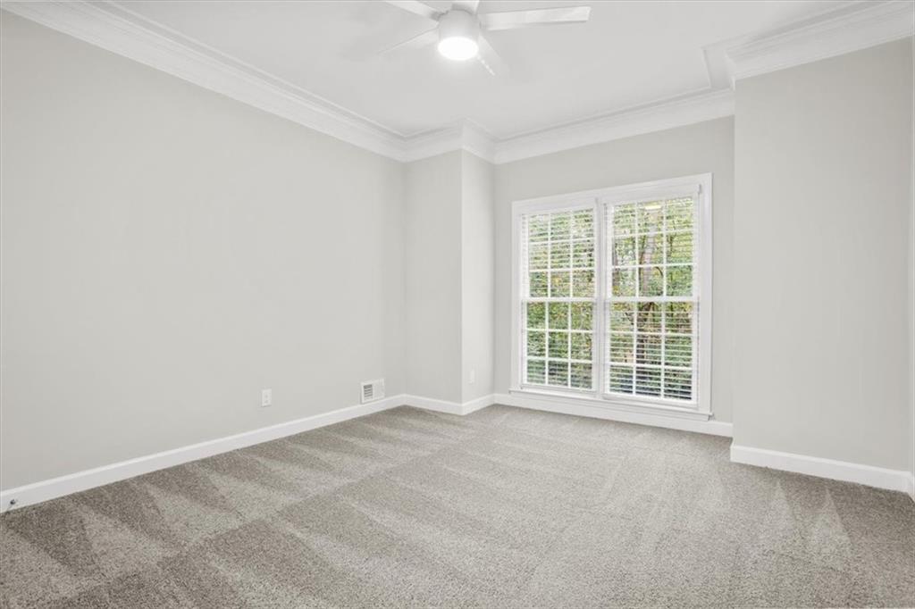 3425 Kingsland Circle Berkeley Lake, GA 30096 - Photo 15 of 45 an empty room with a window