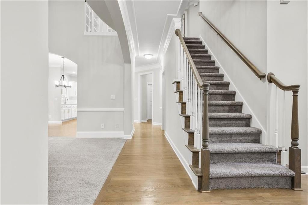 3425 Kingsland Circle Berkeley Lake, GA 30096 - Photo 17 of 45 a view of entryway and gallery with wooden floor
