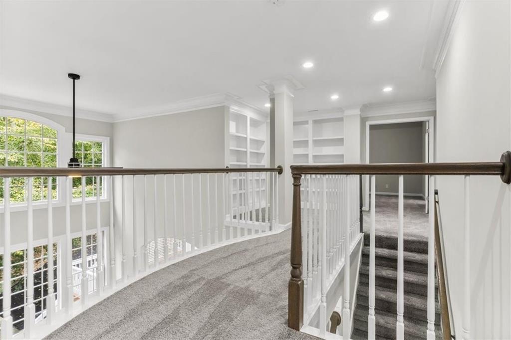 3425 Kingsland Circle Berkeley Lake, GA 30096 - Photo 26 of 45 a view of staircase with white walls and windows