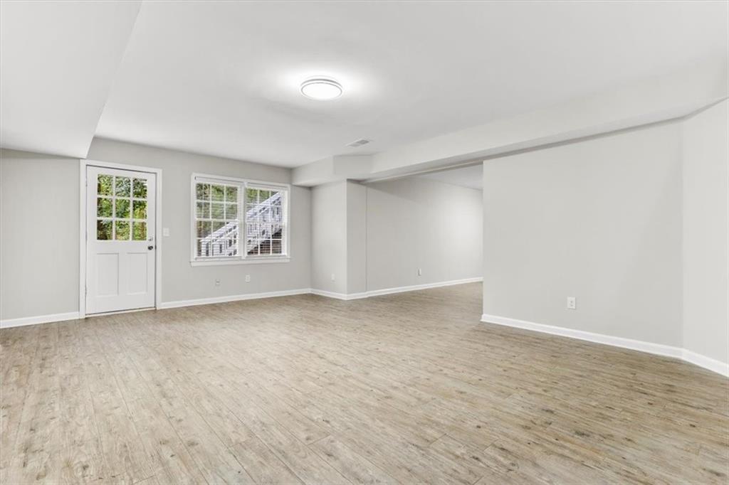 3425 Kingsland Circle Berkeley Lake, GA 30096 - Photo 39 of 45 a view of an empty room with a window