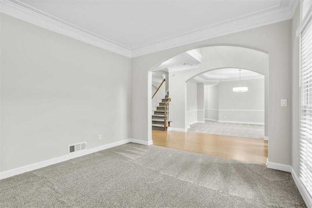 3425 Kingsland Circle Berkeley Lake, GA 30096 - Photo 4 of 45 a view of empty room with wooden floor