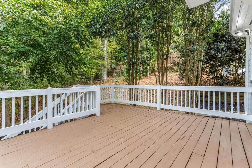 3425 Kingsland Circle Berkeley Lake, GA 30096 - Photo 41 of 45 a view of a wooden roof deck