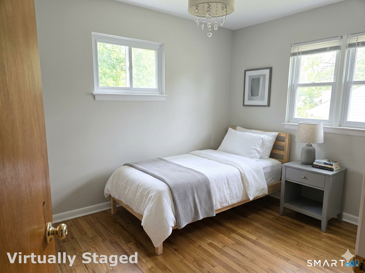 23 Ridgecrest Road Wallingford, CT 06492 - Photo 5 of 7 a bedroom with a bed and a window