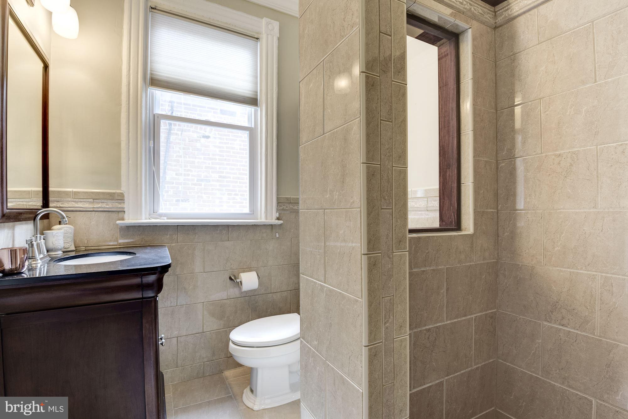 905 Constitution Avenue Northeast Washington, DC 20002 - Photo 17 of 30 Renovated Hall Bath