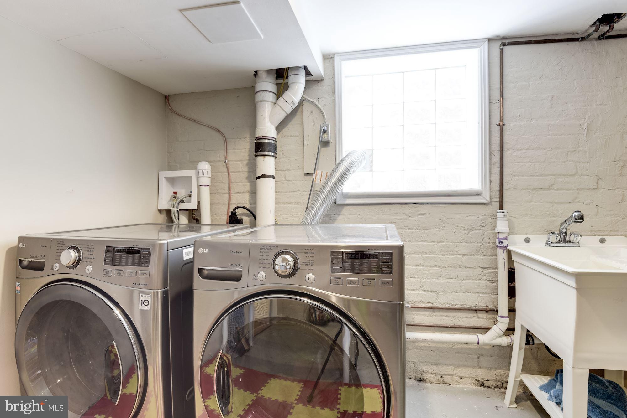 905 Constitution Avenue Northeast Washington, DC 20002 - Photo 23 of 30 Huge laundry & storage room w/ access to rear