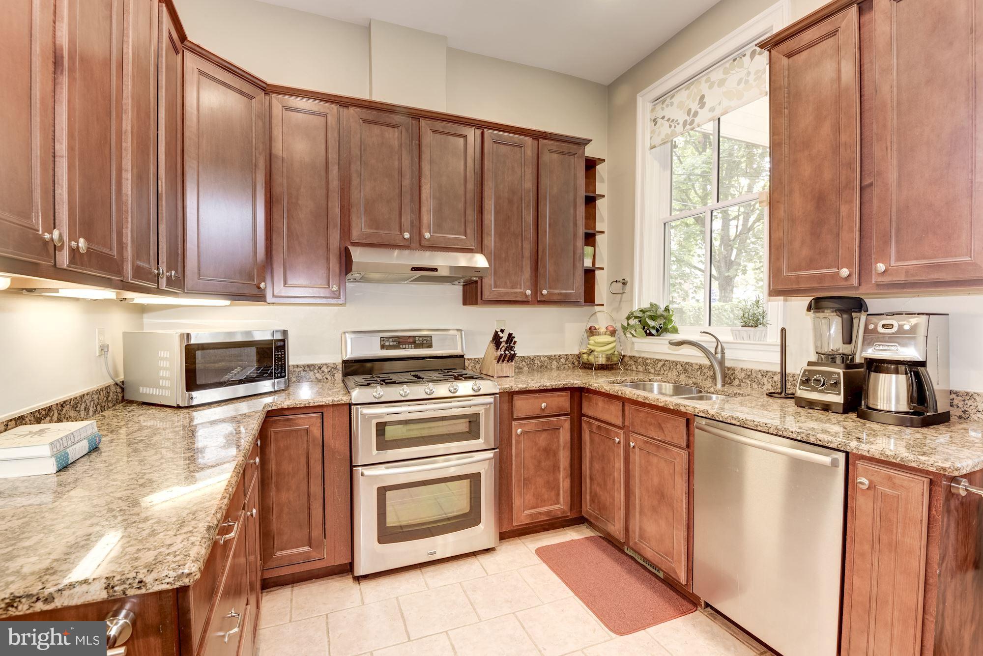 905 Constitution Avenue Northeast Washington, DC 20002 - Photo 10 of 30 ..flows into renovated kitchen w/ SS appliances