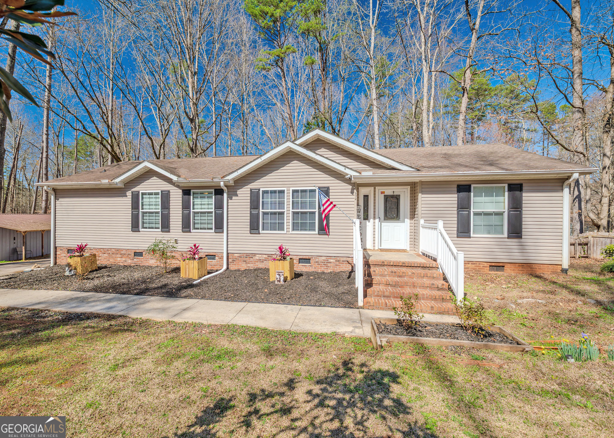 272 Lakeside Trail Martin, GA 30557 - Photo 2 of 35 a front view of a house with a porch