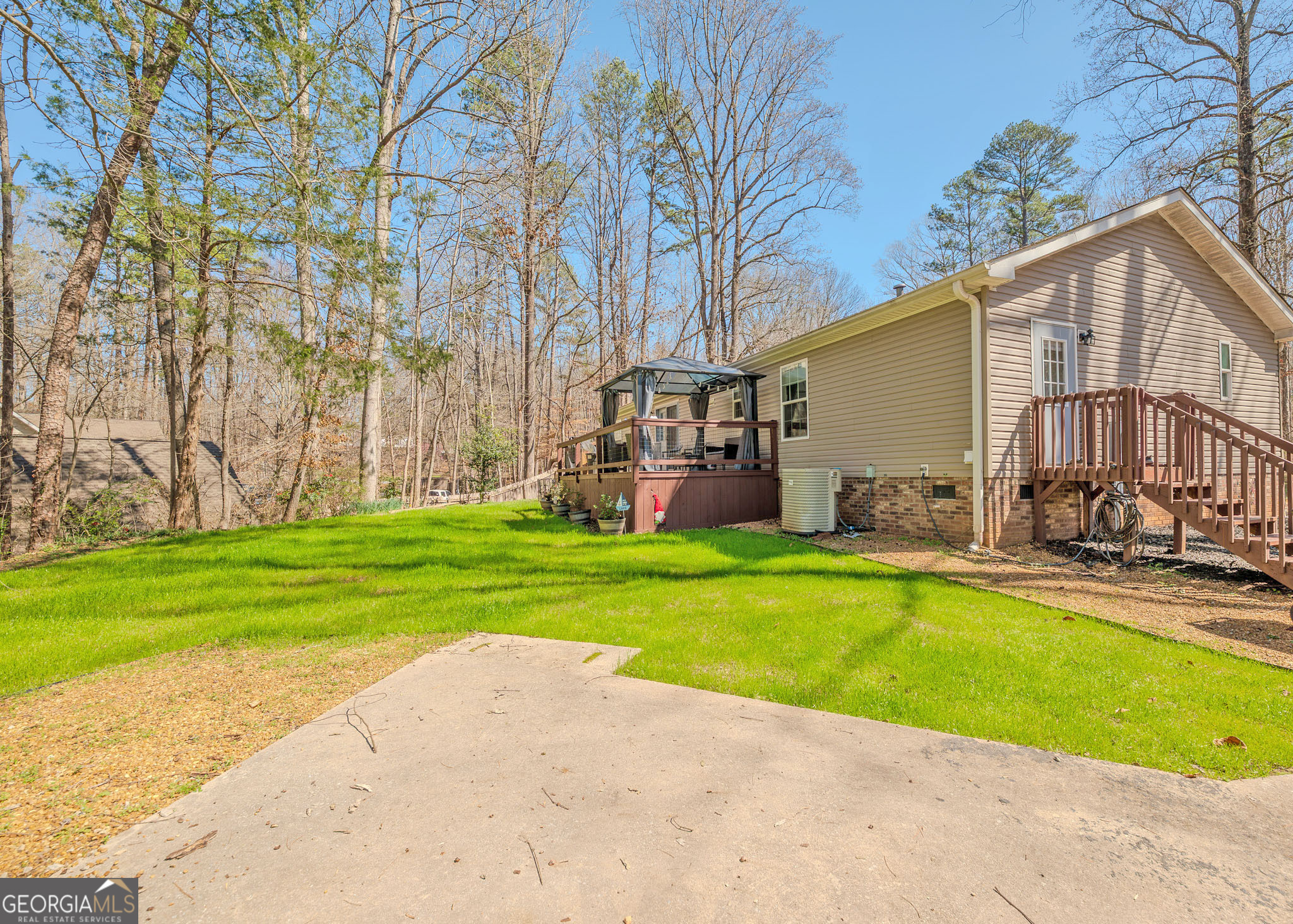 272 Lakeside Trail Martin, GA 30557 - Photo 28 of 35 a view of a house with a yard and sitting area