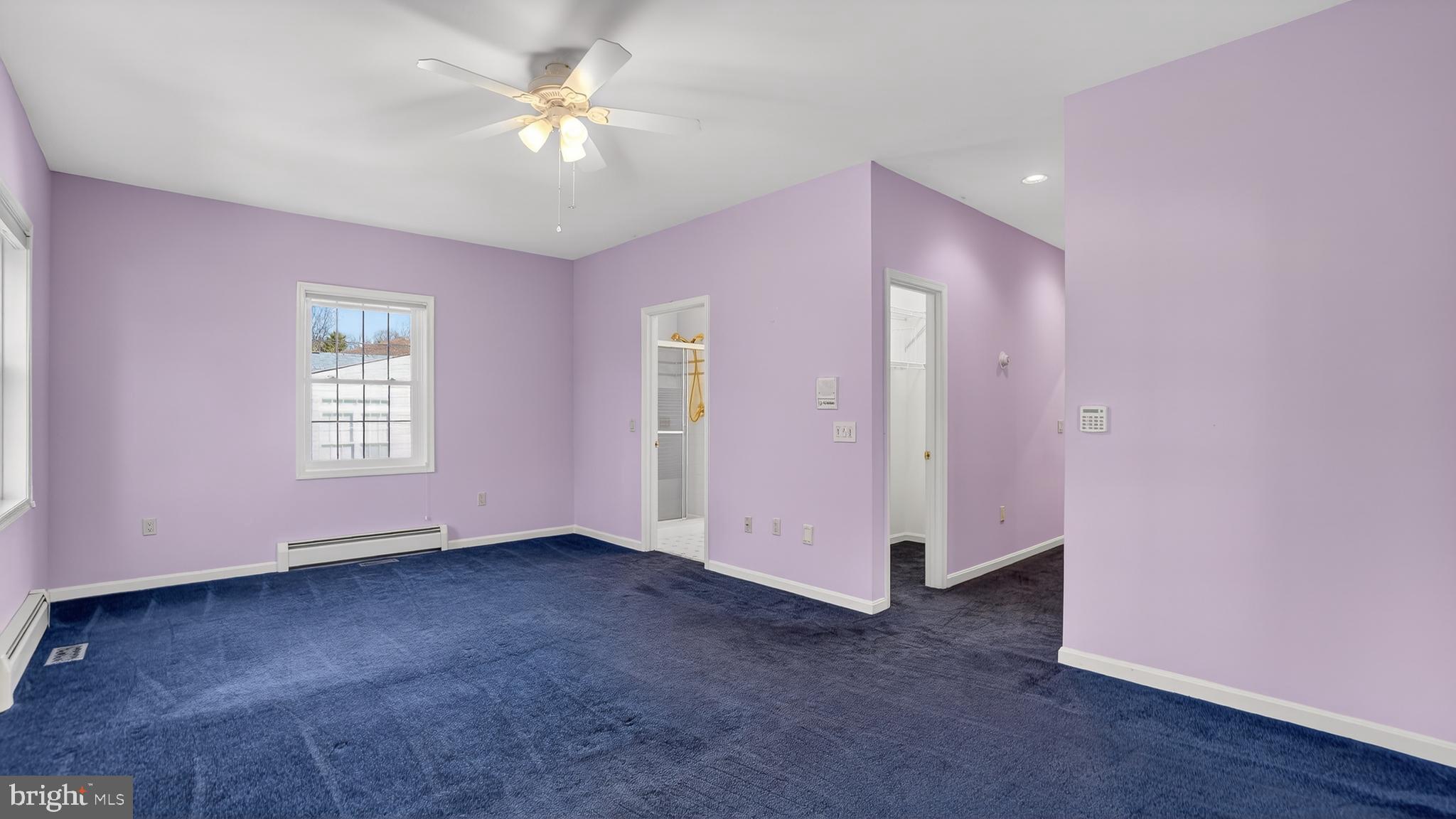 15022 Snowden Drive Silver Spring, MD 20905 - Photo 14 of 88 a view of an empty room with window ceiling fan
