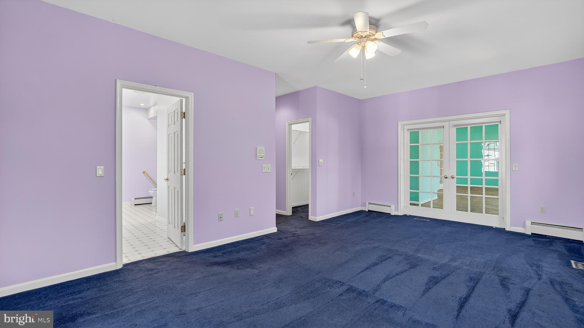15022 Snowden Drive Silver Spring, MD 20905 - Photo 15 of 88 a view of an empty room with a window and a kitchen