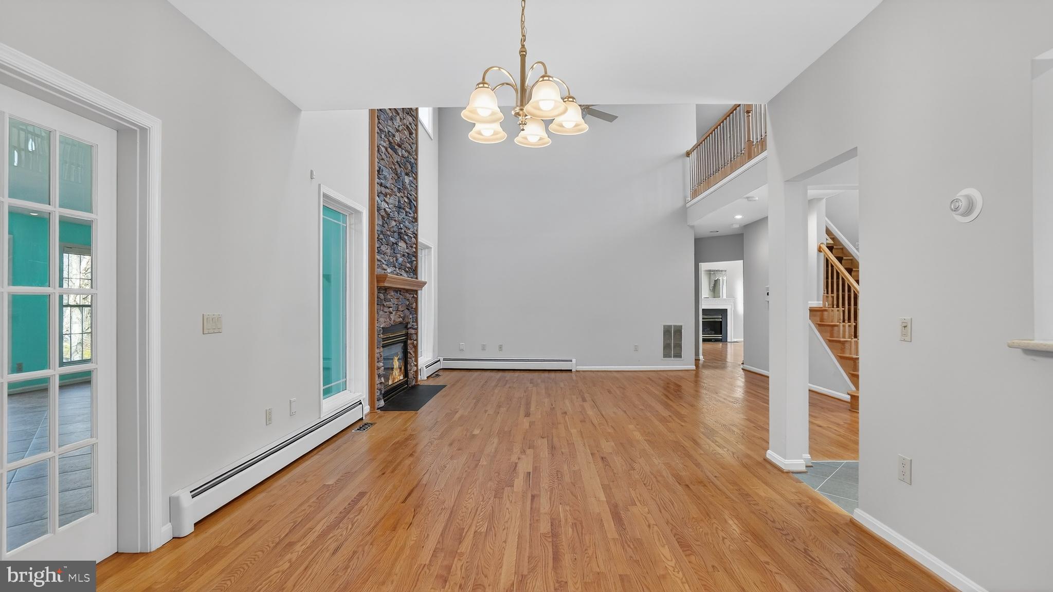 15022 Snowden Drive Silver Spring, MD 20905 - Photo 28 of 88 wooden floor in an empty room with a window
