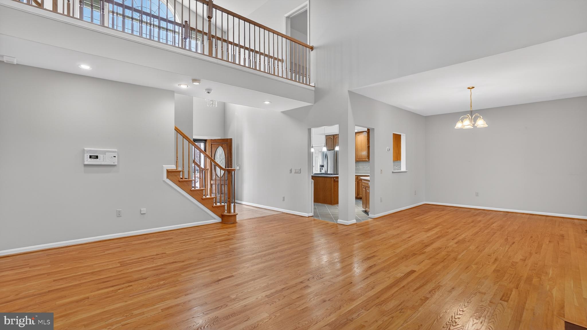 15022 Snowden Drive Silver Spring, MD 20905 - Photo 29 of 88 a view of empty room with wooden floor
