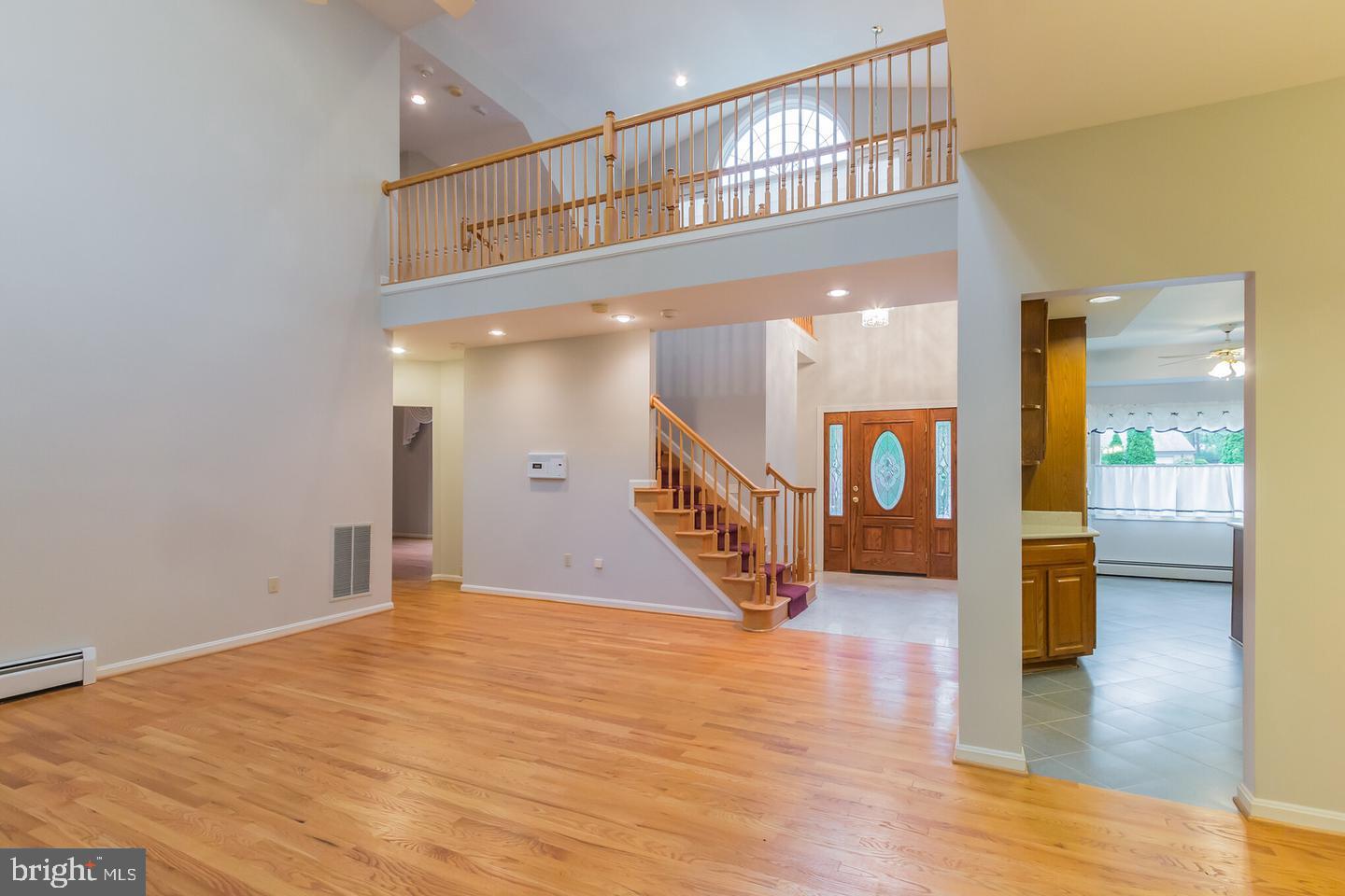 15022 Snowden Drive Silver Spring, MD 20905 - Photo 30 of 88 a view of a hallway with wooden floor