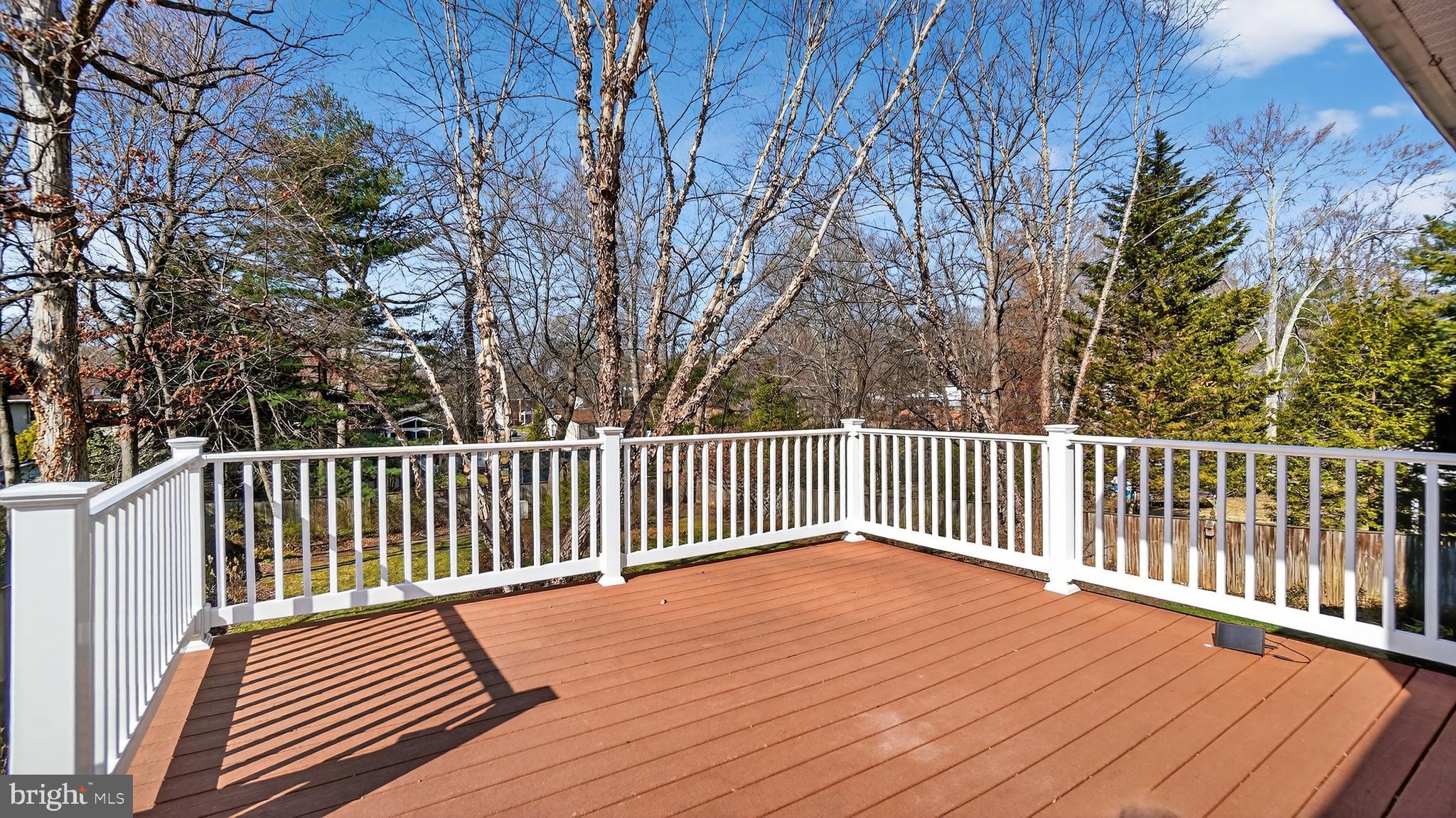 15022 Snowden Drive Silver Spring, MD 20905 - Photo 40 of 88 a view of balcony with wooden floor and fence