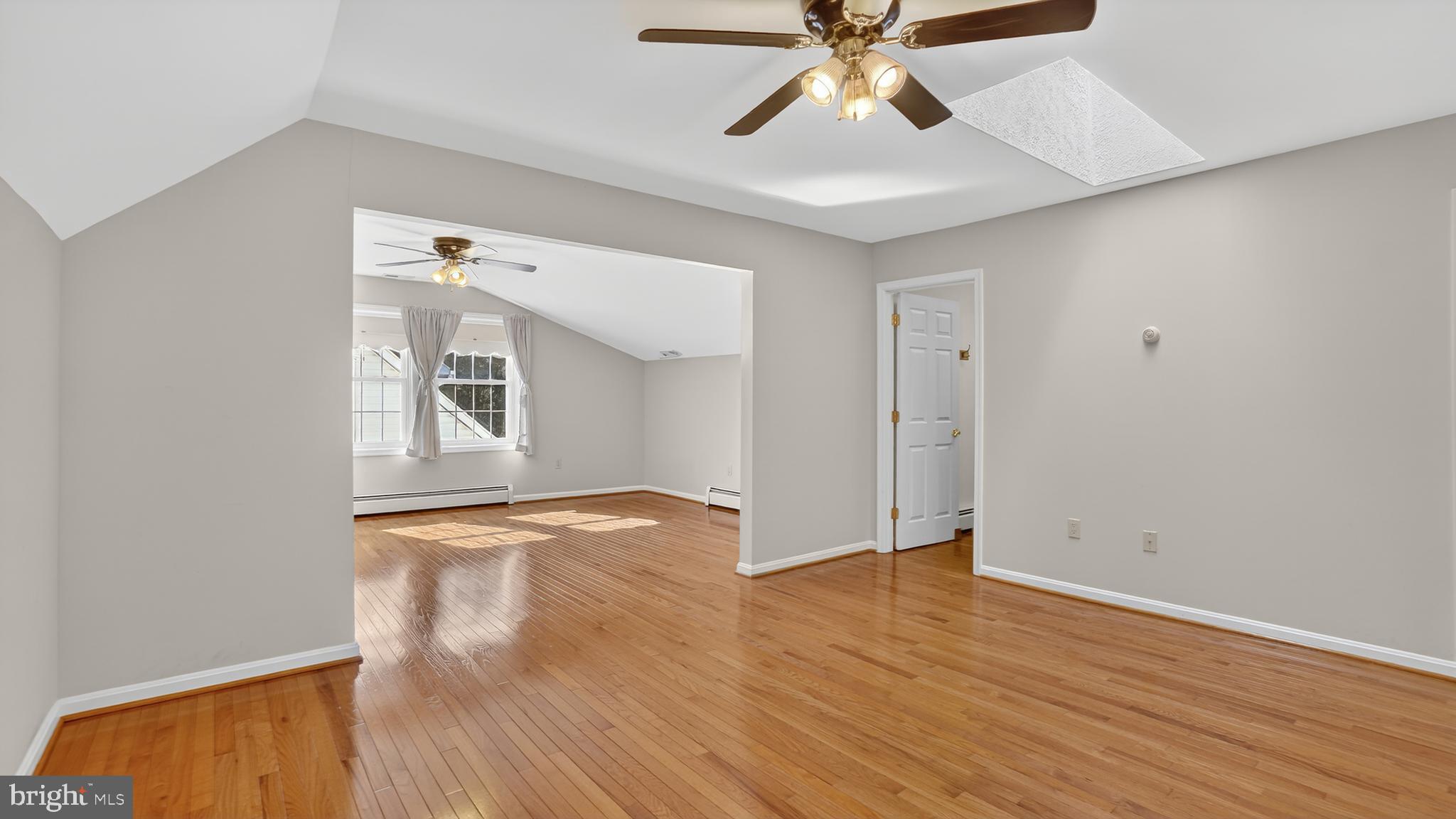 15022 Snowden Drive Silver Spring, MD 20905 - Photo 43 of 88 wooden floor in an empty room with a window