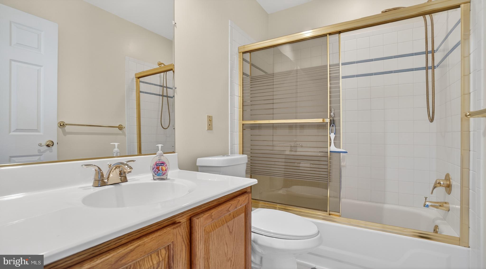 15022 Snowden Drive Silver Spring, MD 20905 - Photo 51 of 88 a bathroom with a sink and a tub