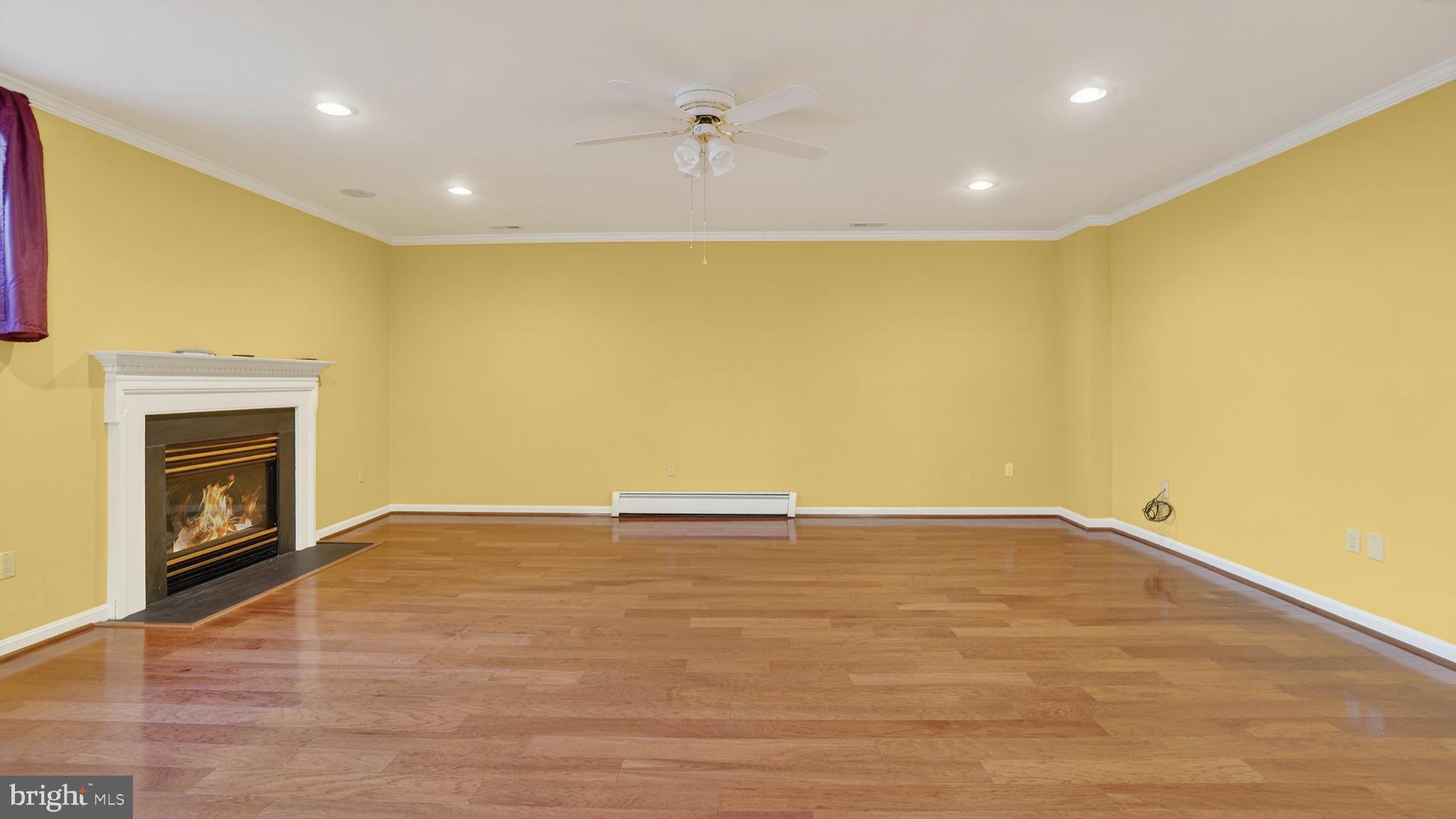 15022 Snowden Drive Silver Spring, MD 20905 - Photo 64 of 88 a view of an empty room with a fireplace