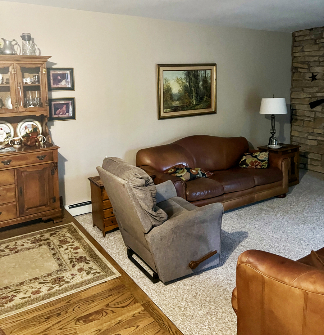 1321 Burr Oak Road Homewood, IL 60430 - Photo 7 of 15 a living room with furniture and a rug