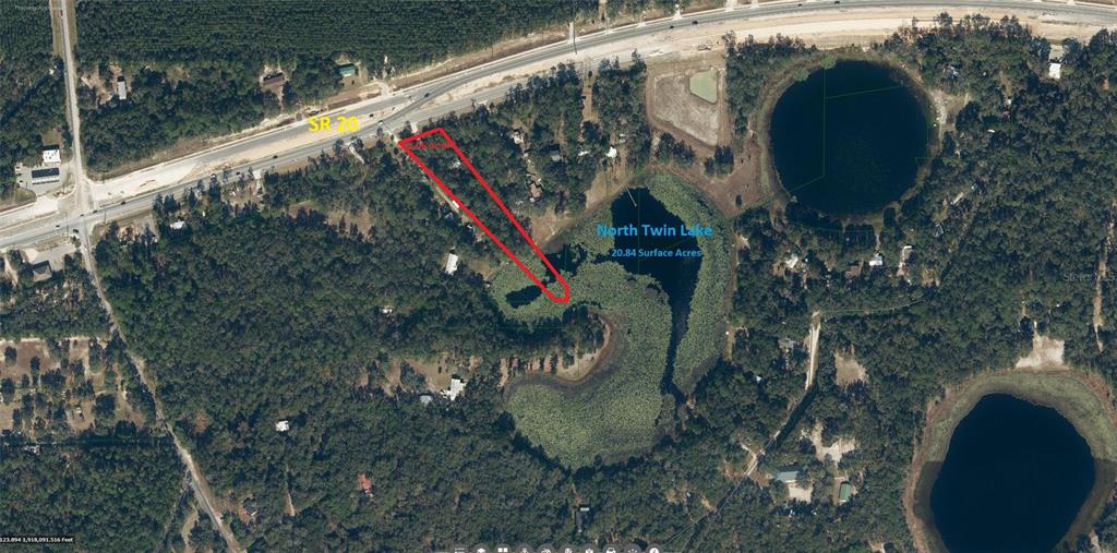 1963 Highway 20 Hawthorne, FL 32640 - Photo 2 of 12 a view of a tree in a yard next to a yard