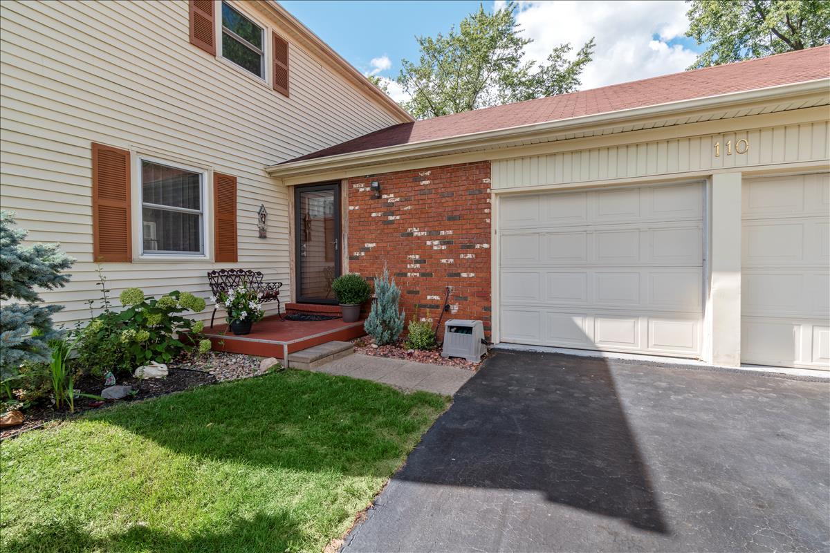 110 Stonegate Road Buffalo Grove, IL 60089 - Photo 2 of 25 a view of a house with backyard and porch