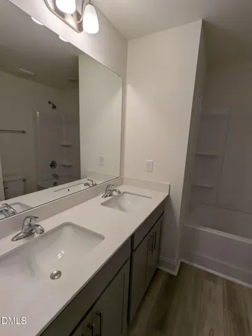 a view of a swimming pool with a yard