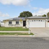 front view of house with a yard