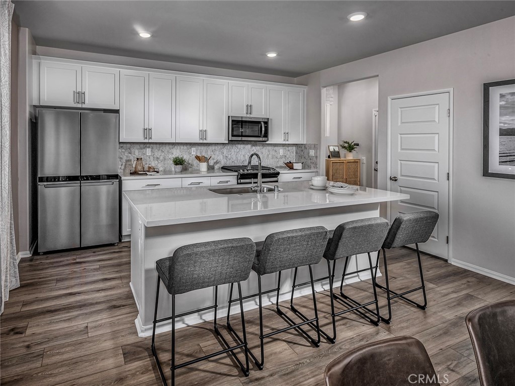 2043 Grapefruit Street Redlands, CA 92374 - Photo 3 of 11 Photo is not of the actual home, but is an inspirational photo of builder’s model home and may depict options, furnishings, and/or decorator features that are not included