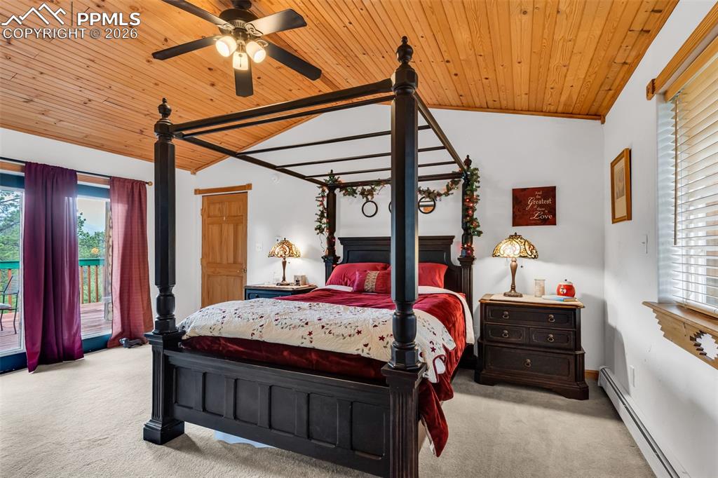209 Rosewood Road Westcliffe, CO 81252 - Photo 22 of 49 Master bedroom with walkout to deck and incredible mountain views