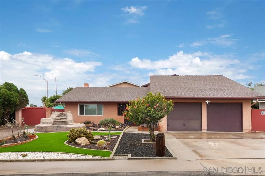10941 Del Rio Road Spring Valley, CA 91978 - Photo 1 of 19 a front view of house with yard outdoor seating and barbeque oven