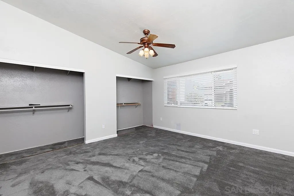 10941 Del Rio Road Spring Valley, CA 91978 - Photo 12 of 19 a view of a livingroom with a ceiling fan and window