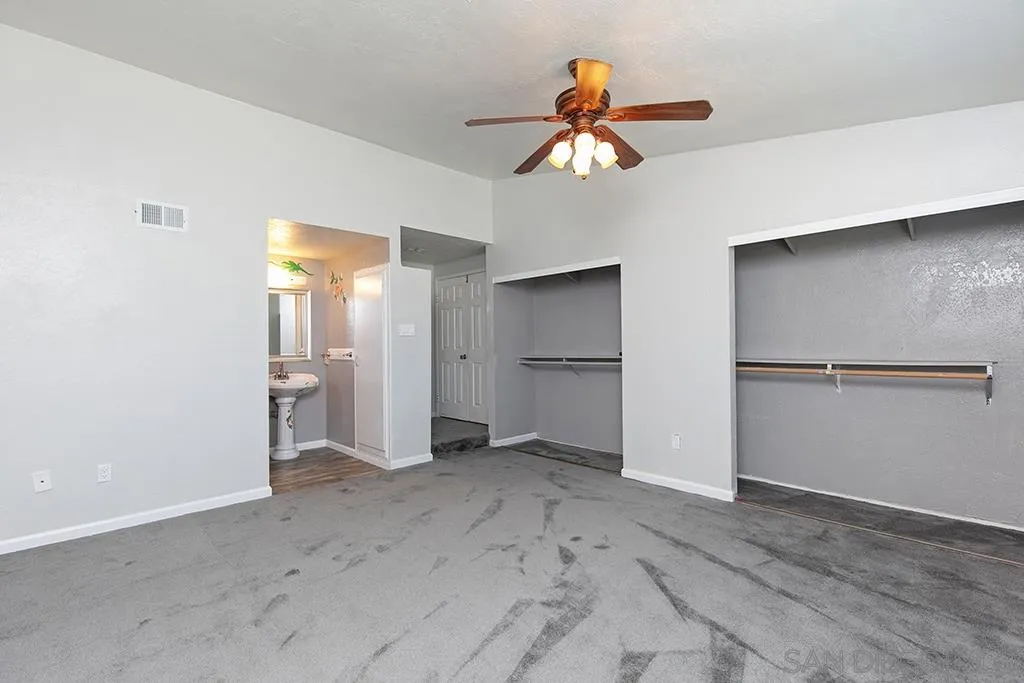 10941 Del Rio Road Spring Valley, CA 91978 - Photo 13 of 19 a view of a livingroom with a chandelier