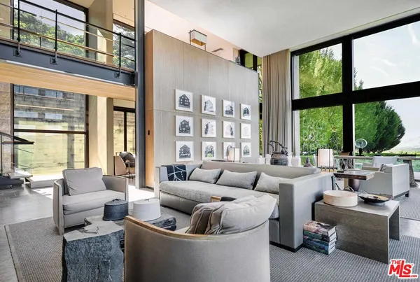 a balcony with furniture and city view