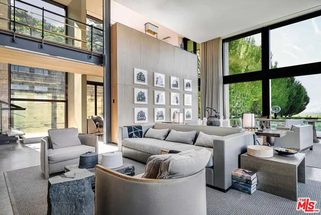 a balcony with furniture and city view