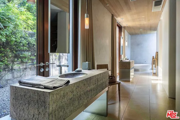 a bed room with a bed and a couch