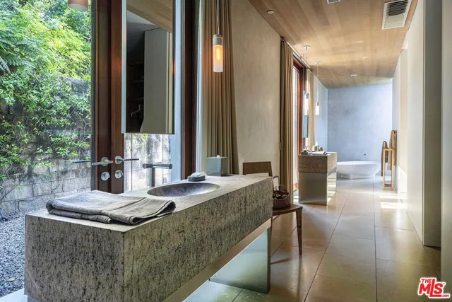 a bed room with a bed and a couch