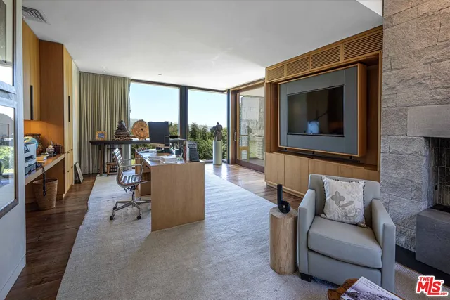 a workspace with furniture and window