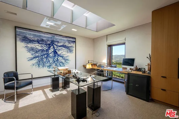 a view of swimming pool from a balcony