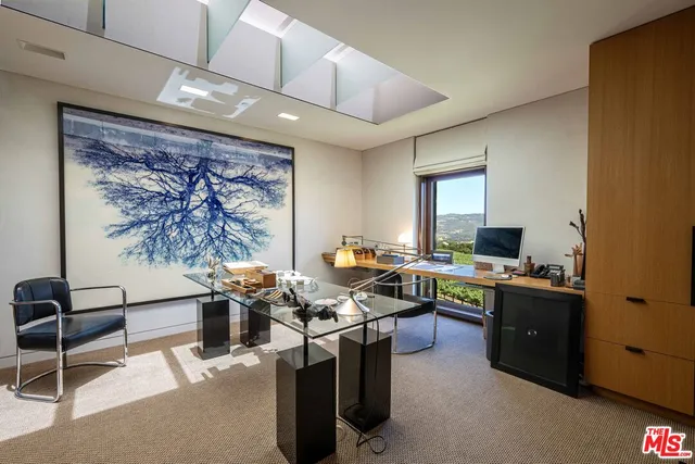 a view of swimming pool from a balcony